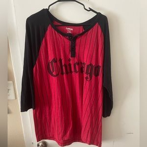 Quarter sleeve black and red striped shirt, Chicago across the chest.